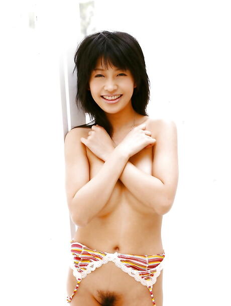 Luscious japanese young Sasa Handa in bikini exposing big hooters and sexy butt 